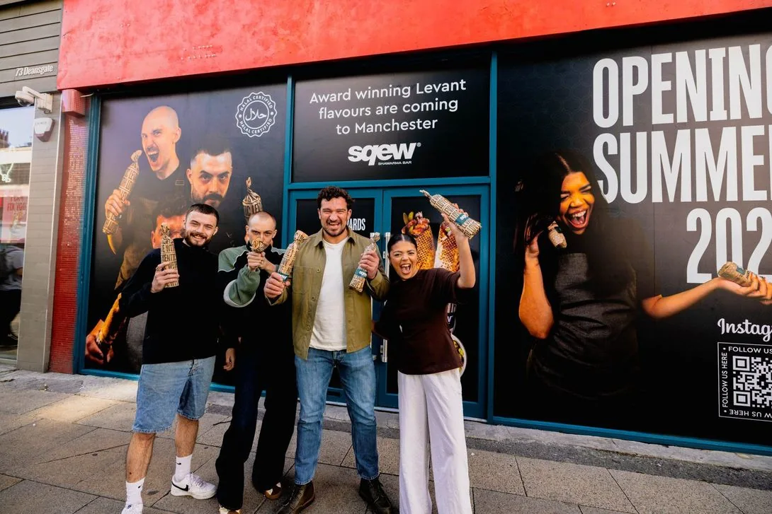 The Sqew team celebrating outside their new Manchester store